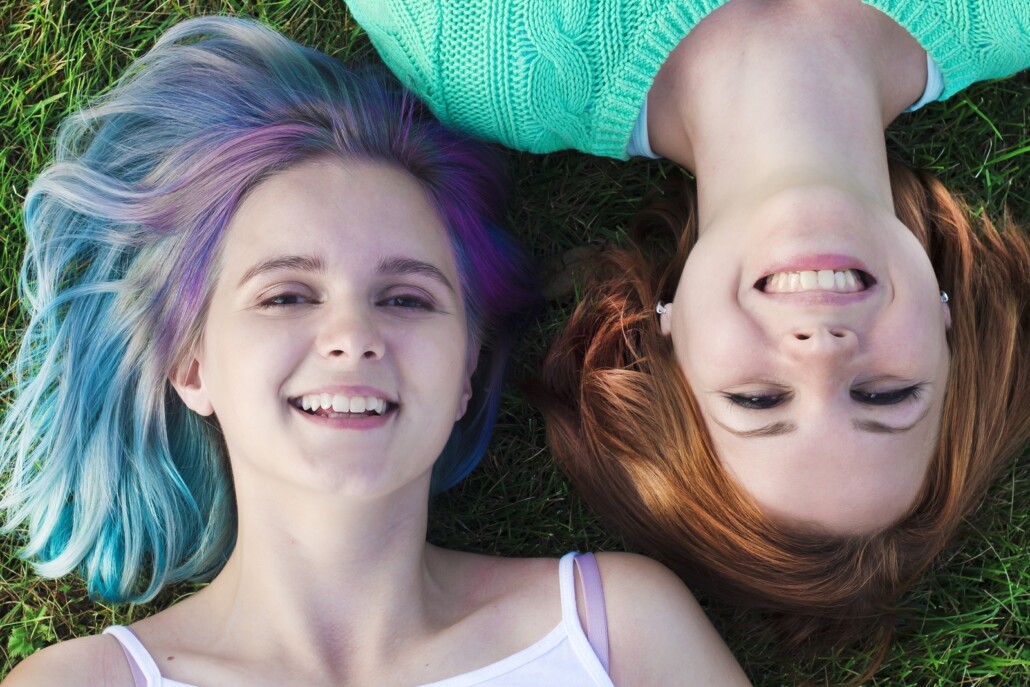 Teens girls smiling. Online counseling for teens can help you better deal with issues relating to teh LGBTQ community. If you need group therapy for teens in San Francisco, CA for support or support for lgbtq youth in west bloomfield, mi, call now!
