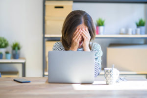 A woman covers her face as she sits in front of her laptop. An online therapist in Michigan can offer support for perfectionism in work and life. Contact a young adult therapist in West Bloomfield, MI to learn more about online therapy in California and other services today! 94118 | 48322 | 48323