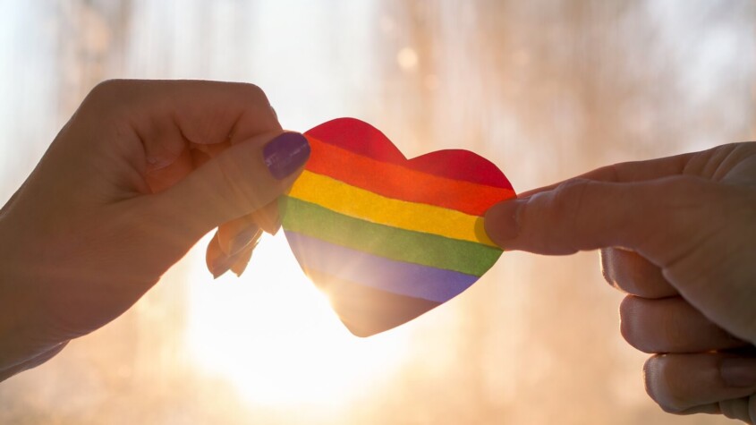 Two hands hold either side of a rainbow heart as the sun shines behind it. Therapyology acknowledges the struggles of individuals identifying as LGBTQ+. They offer LGBTQ therapy in west bloomfield, mi, gender therapy in west bloomfield, mi, and more. Contact us today to get in touch with an lgbt ally in west bloomfield, mi